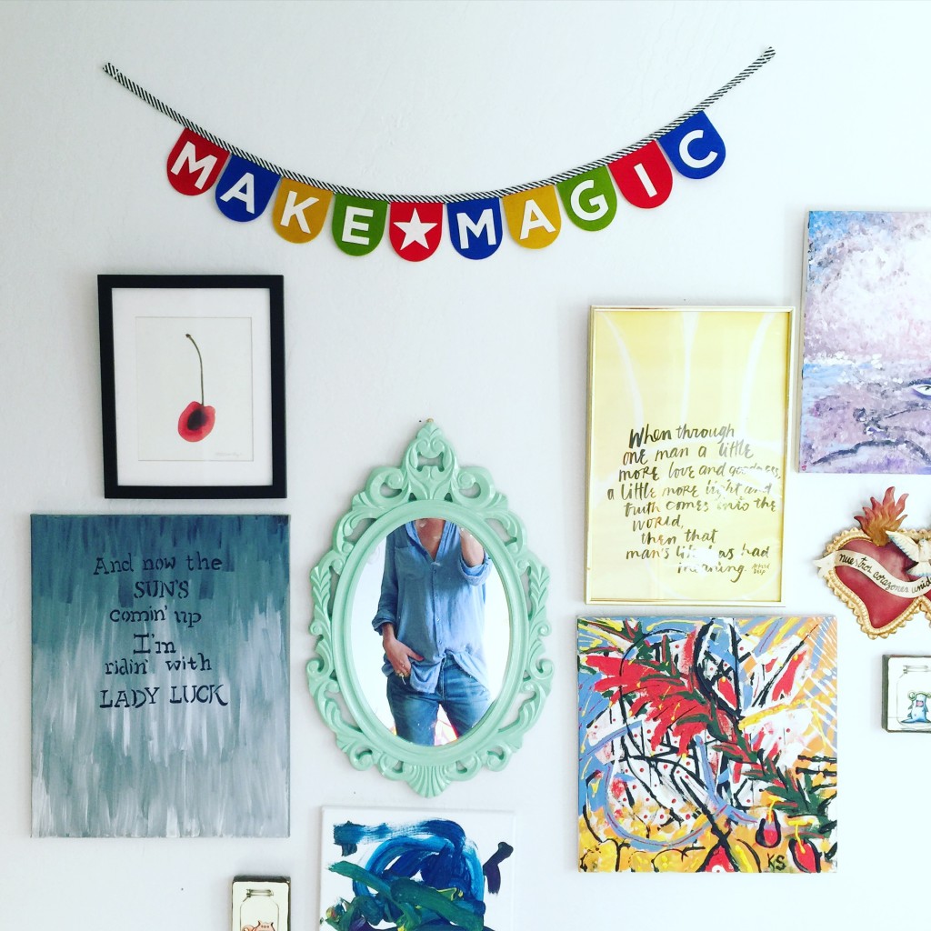 A make magic banner from online shop glam | camp hanging in a gallery wall