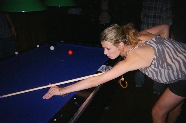 Playing pool in a dark Brooklyn bar
