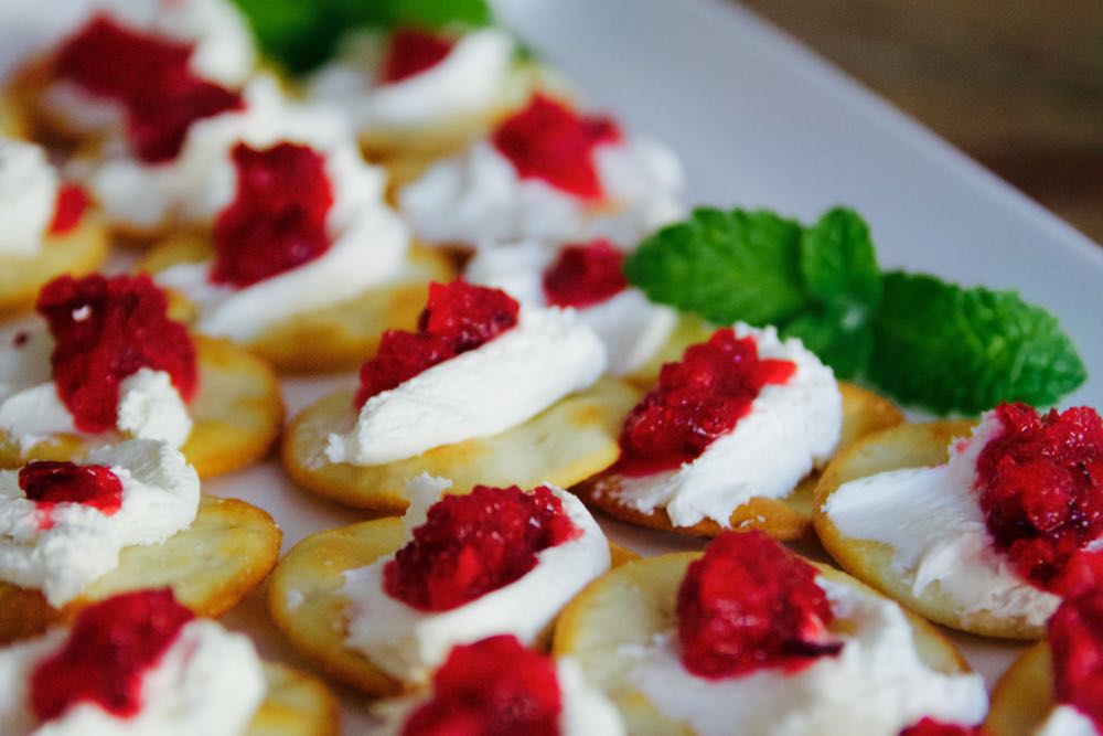 cream cheese and cranberry-orange compote on crackers