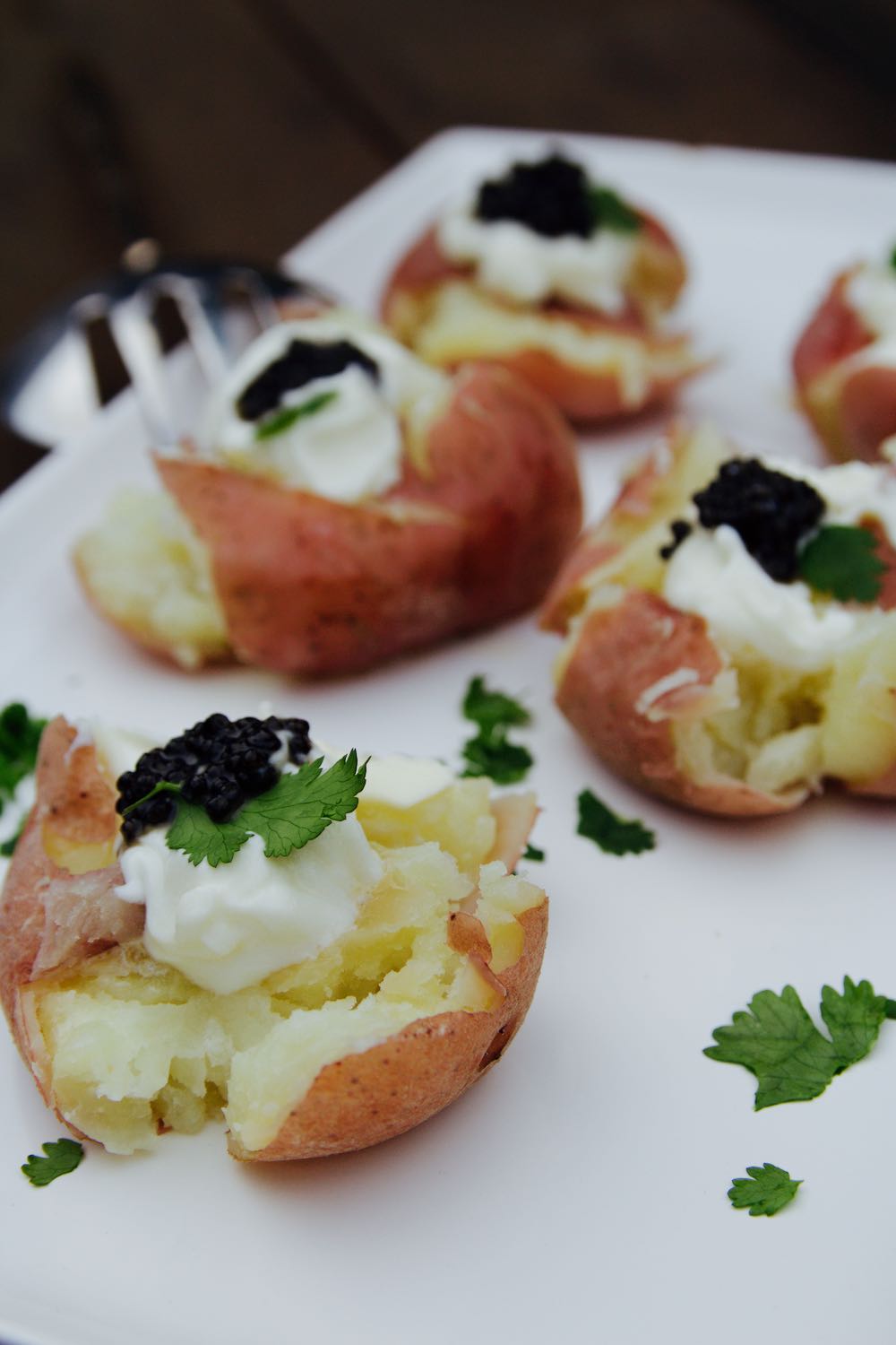 smashed potatoes with caviar and sour cream