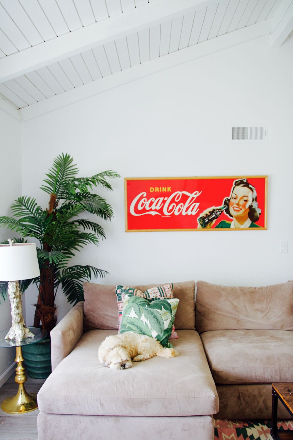 Vintage coca-cola sign in white living room
