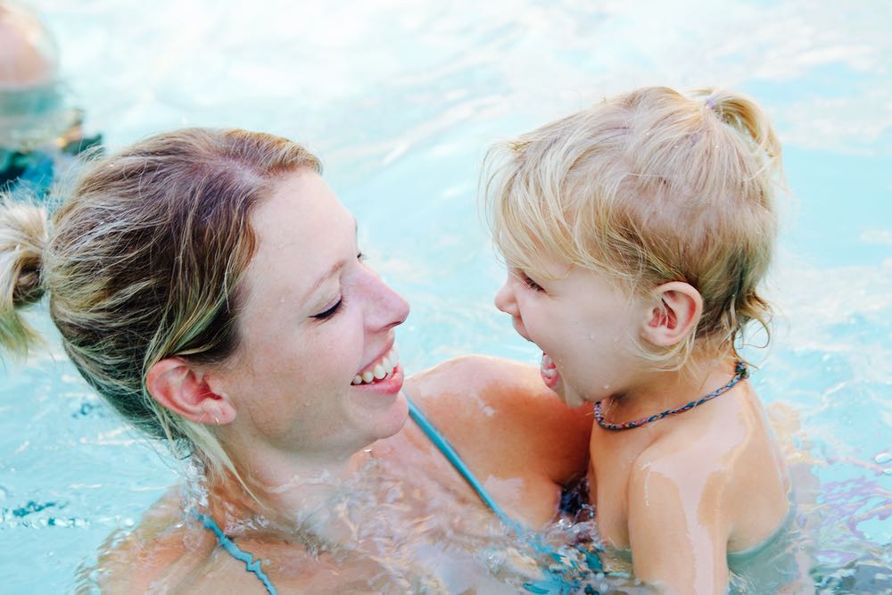 swimming in the pool with mom