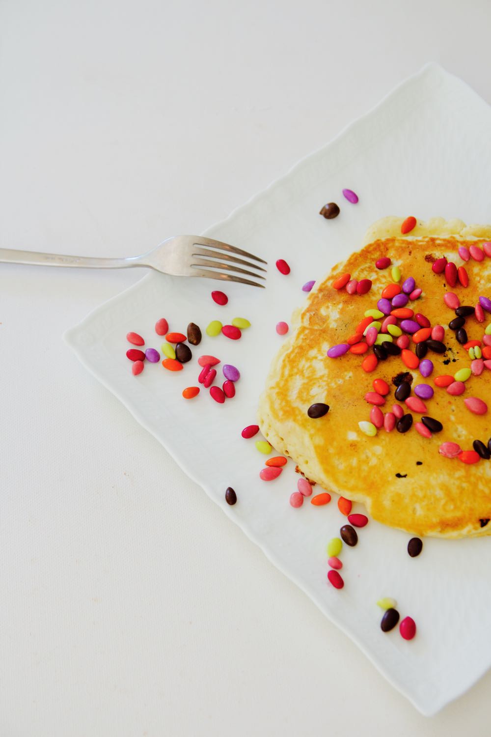 recipe for rainbow pancakes with chocolate and sunflower seeds