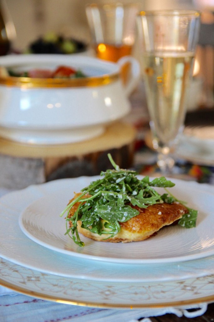 chicken francese topped with arugula