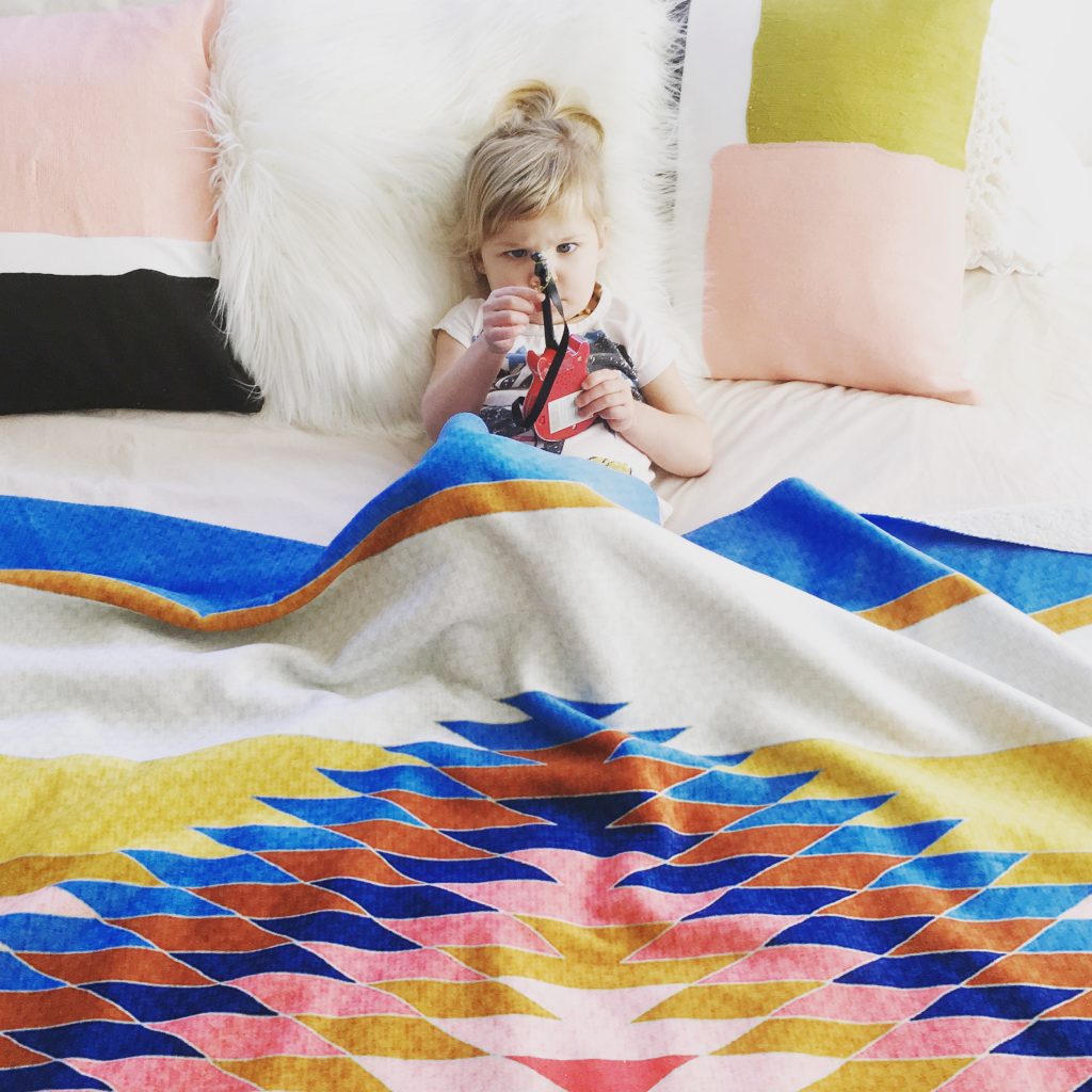 multicolored sherpa fleece blanket available on glam camp