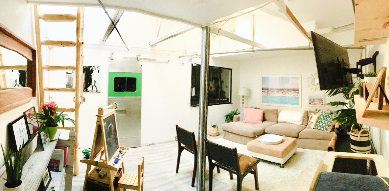 panorama of garage renovation into rec room and studio